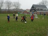 Voetbalpieten bezoeken training S.K.N.W.K. JO9-1 en JO7-1 op zaterdag 4 december 2021 (22/75)